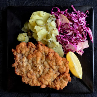 Wiener Schnitzel with Potatoes and Red Cabbage Slaw